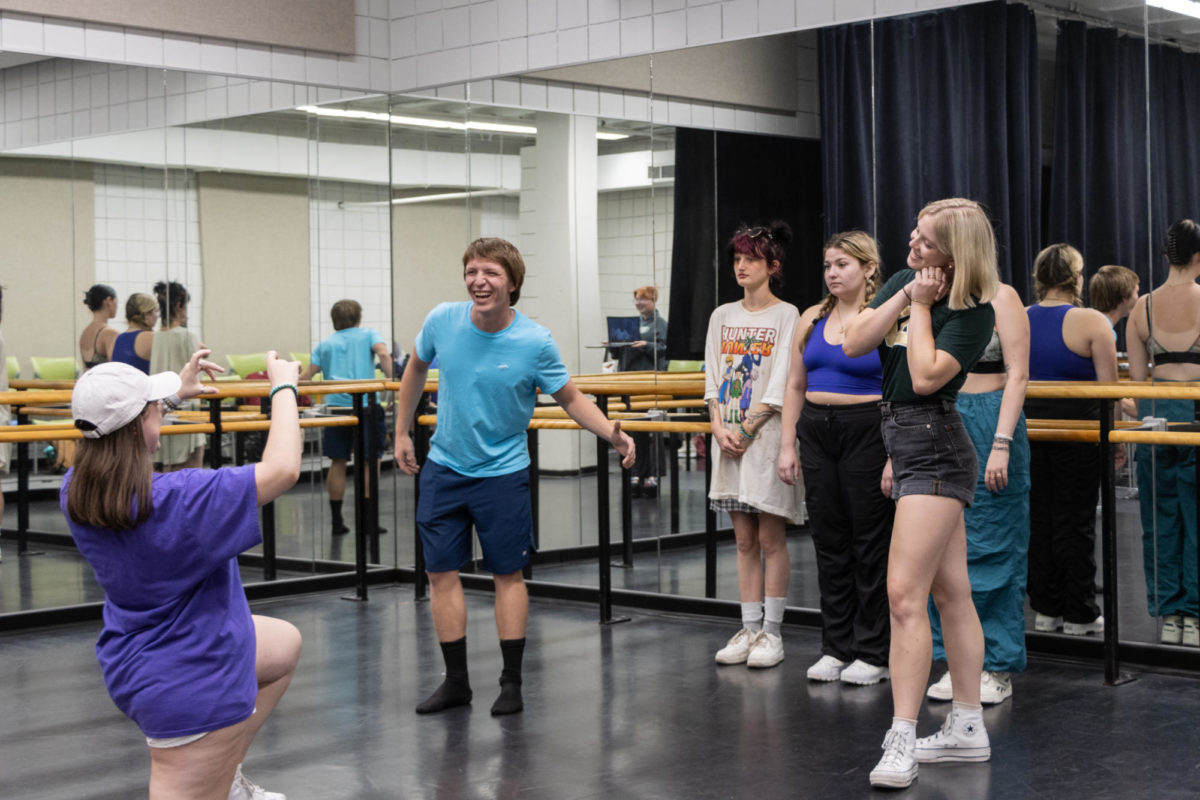 The cast of "The Rocky Horror Picture Show" rehearsing in the Fine Arts Center. 